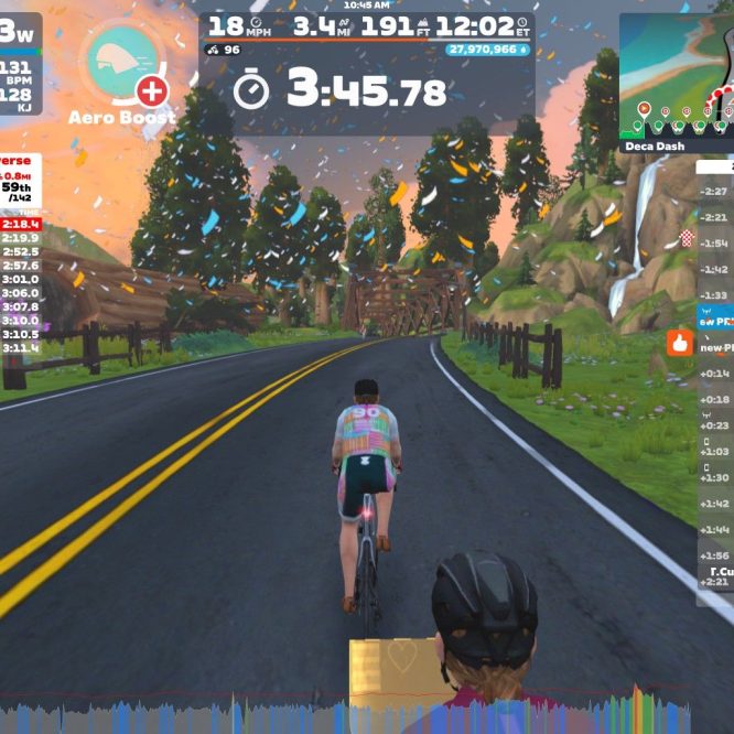 A cyclist is riding on a scenic virtual road in Zwift, showcasing a digital landscape with trees, a farm, and a mountainous backdrop. The HUD displays cycling performance metrics, race results, and nearby Zwift users, along with a timer indicating the current progress in a race.