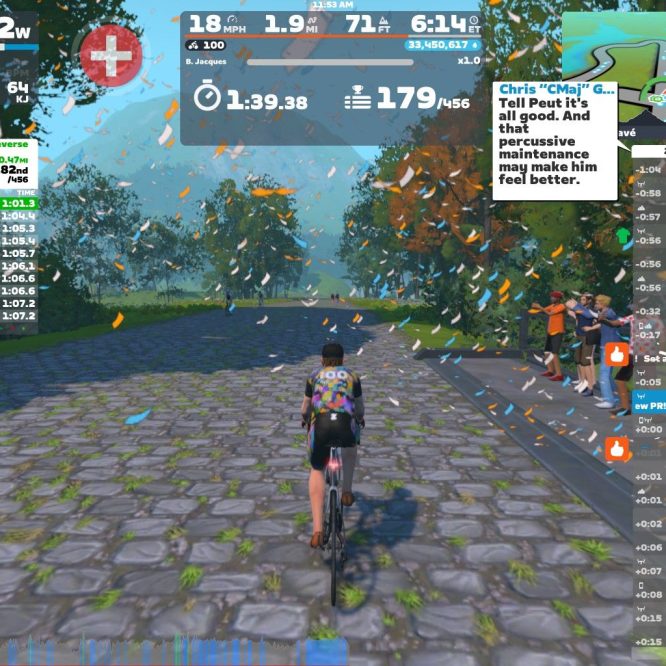 A cyclist rides on a virtual cobblestone path in Zwift, surrounded by trees and colorful confetti. The screen displays performance metrics, including speed, distance, and rankings of other racers. Chat messages and avatars of nearby riders are visible in the corners.